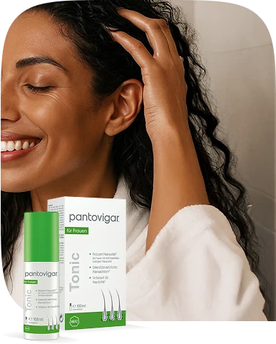 „Pantovigar® Tonic – Frau massiert Tonic sanft ein zur Förderung von Haarwachstum, mehr Haardichte und weniger Haarausfall.